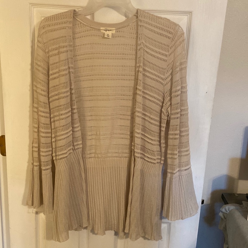 Super pretty cream, colored cardigan lots of detail